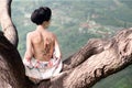 Woman with snake tattoo on her back, original