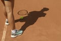 Woman in sneakers clay court with tennis ball Royalty Free Stock Photo