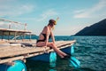 Woman in snorkeling gear on raft Royalty Free Stock Photo