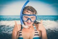 Woman with snorkeling mask for diving stands near the sea Royalty Free Stock Photo