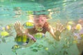Woman snorkeling underwater in sea