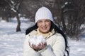 Woman with snow in a winter sunny day Royalty Free Stock Photo