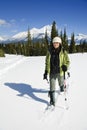 Woman snowshoeing in the Canadian rockies