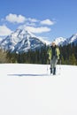 Woman snowshoeing in the Canadian rockies