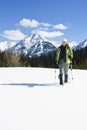 Woman snowshoeing in the Canadian rockies