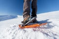 Woman snowshoeing in winter Carpathian mountains