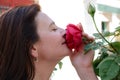 Woman snuggling up to the flower Royalty Free Stock Photo