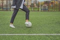 woman soccer player with ball on the field. ball dribbling, feint. Royalty Free Stock Photo