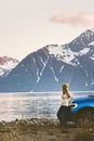 Woman solo traveling by rental car road trip in Norway Royalty Free Stock Photo