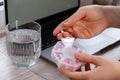 Woman sorting pills Organizer weekly shots Closeup of medical pill box with doses of tablets for daily take medicine