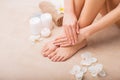 Woman at spa with done manicure and pedicure Royalty Free Stock Photo