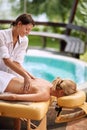 Woman at spa and wellness back massage treatment Royalty Free Stock Photo