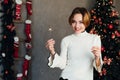 Woman with sparkler celebrates New Year's Eve Christmas Royalty Free Stock Photo