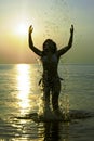 Woman in the sparks of water Royalty Free Stock Photo