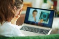 Woman speaking with doctor in house in sunny day Royalty Free Stock Photo