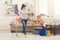 Woman with special equipment cleaning house