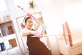 A woman in a special uniform does the cleaning. Royalty Free Stock Photo