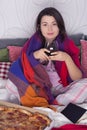 Woman spending evening in bed Royalty Free Stock Photo