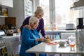 Woman spending time with her elderly mother