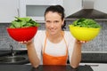 Woman with a spinach in a modern kitchen