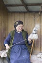 a woman spinning wool in Romania