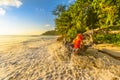 Woman splashing wave Seychelles