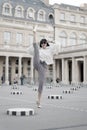 Woman split leg on square in paris, france