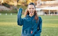 Woman, sport celebration and winner portrait with excited coach on a field for game and workout. Training, yes and