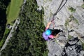 Woman is sport climbing