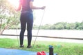 Woman in sport clothing holding jumping rope, Healthy lifestyle Royalty Free Stock Photo