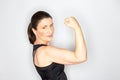 Woman sports outfit showing muscles Royalty Free Stock Photo