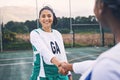 Woman, sports and smile for handshake, partnership or friends in fun game on the court together. Happy sporty female Royalty Free Stock Photo