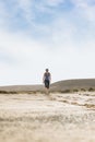 Woman in Sportswear Doing Fitness Walk in Desert