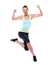 Woman sportswear happy jumping Royalty Free Stock Photo