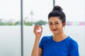 Woman in sportswear holding the rubber ball hand grip exercise Royalty Free Stock Photo