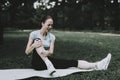 Woman in Sportswear after Yoga Exercises in Park