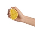 Woman squeezing fresh lemon juice isolated on white