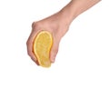 Woman squeezing fresh lemon juice isolated on white Royalty Free Stock Photo