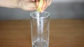 Woman squeezing lemon juice