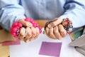 Woman squeezing stress balls in office, closeup Royalty Free Stock Photo