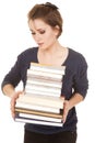 Woman stack of books holding look at