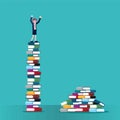 Woman on stack of books