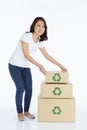 Woman stacking up cardboard boxes Royalty Free Stock Photo