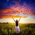 Woman stadning on field Royalty Free Stock Photo