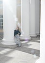 Woman stand at a column Alexander Palace, 18th century. Pushkin, suburb of St. Petersburg. Royalty Free Stock Photo