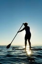 Woman on Stand Up Paddle Board Royalty Free Stock Photo