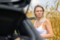 Woman standing by a car Royalty Free Stock Photo