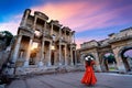 Woman standing in Celsus Library at Ephesus ancient city in Izmir, Turkey. Royalty Free Stock Photo