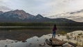 Woman standing checking out the view on Pyramid lake in Jasper Royalty Free Stock Photo