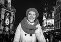 Woman standing at Christmas on Staromestske namesti in Prague